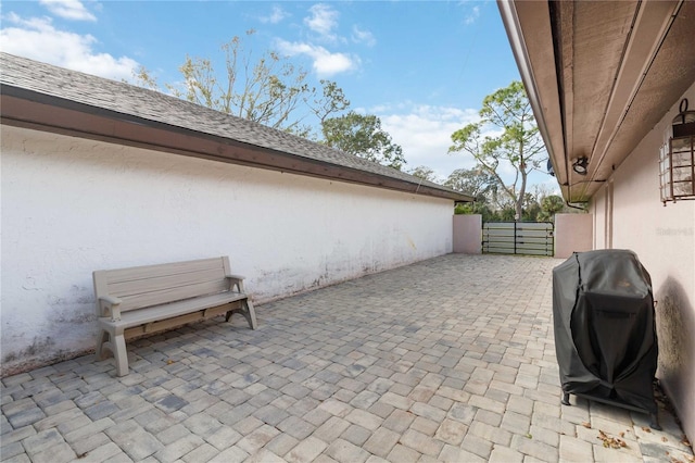 view of patio with a grill