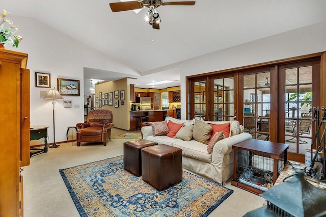 living room featuring carpet flooring, ceiling fan, lofted ceiling, and french doors