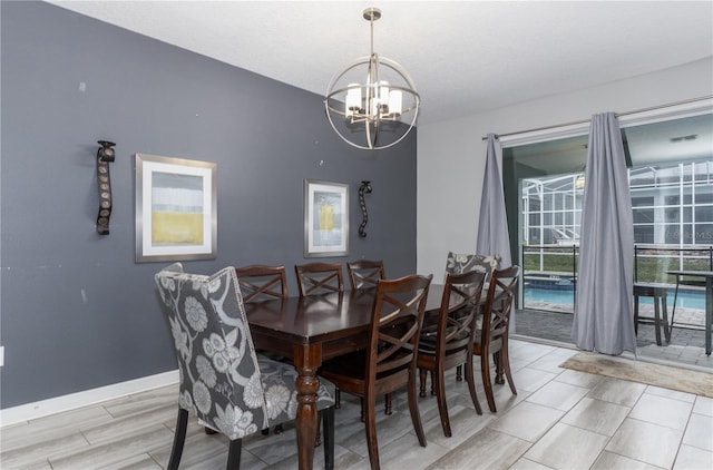 dining room featuring an inviting chandelier