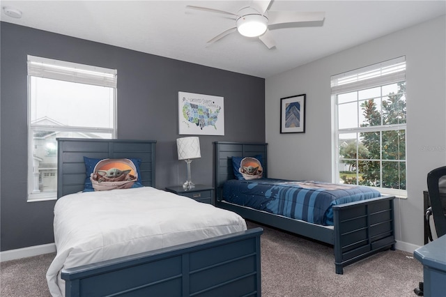 carpeted bedroom with ceiling fan