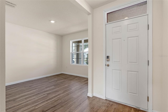 entrance foyer with wood-type flooring