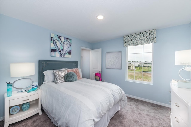 bedroom with light carpet