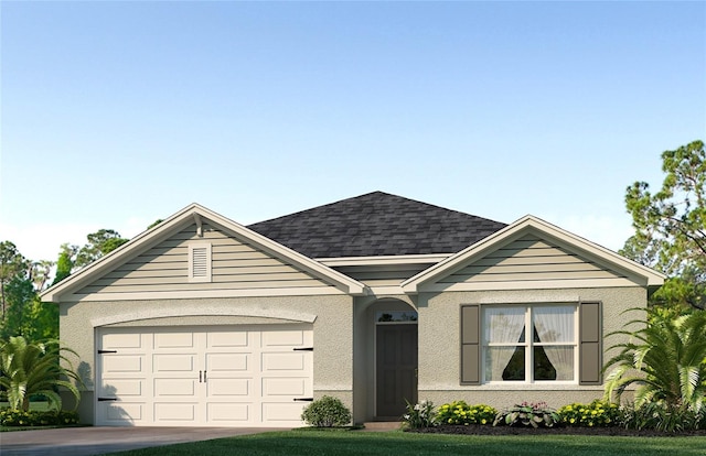 view of front of home featuring a garage and a front lawn