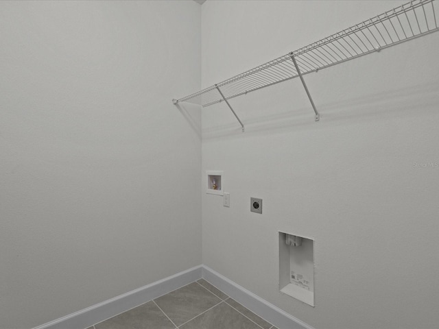 laundry room with electric dryer hookup, tile patterned floors, and washer hookup