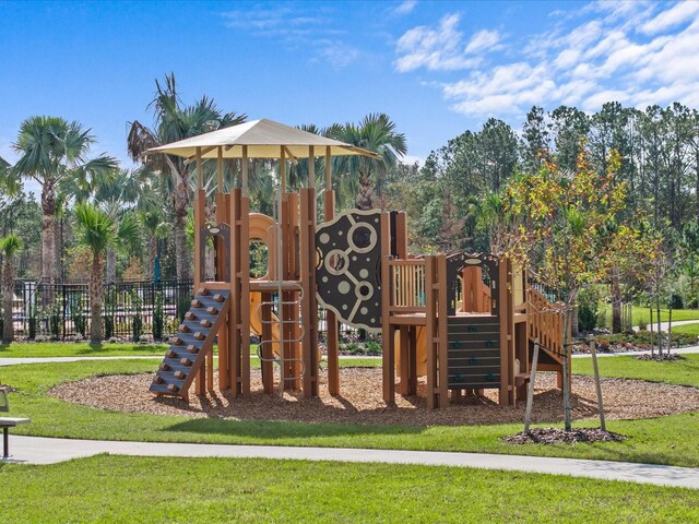 view of playground featuring a yard