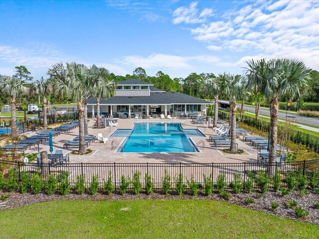 view of pool featuring a patio area