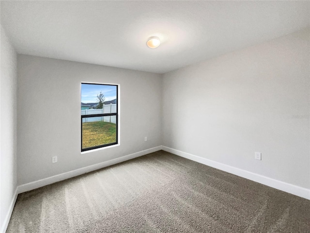 view of carpeted spare room