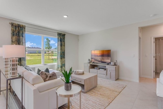 living room with light tile patterned flooring