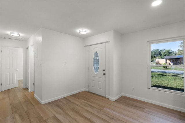 entrance foyer featuring light hardwood / wood-style floors