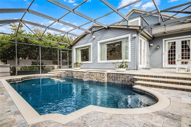 view of pool featuring a lanai, a patio, and pool water feature