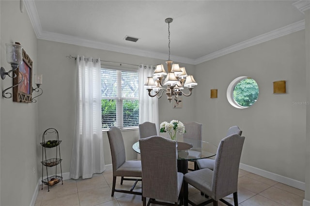 tiled dining space with a chandelier and ornamental molding