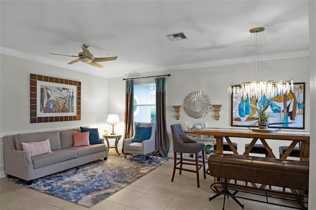 tiled living room with ceiling fan with notable chandelier, visible vents, and crown molding