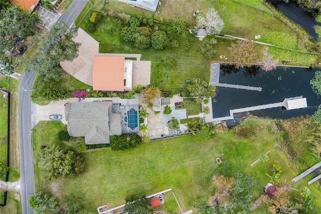 drone / aerial view with a water view