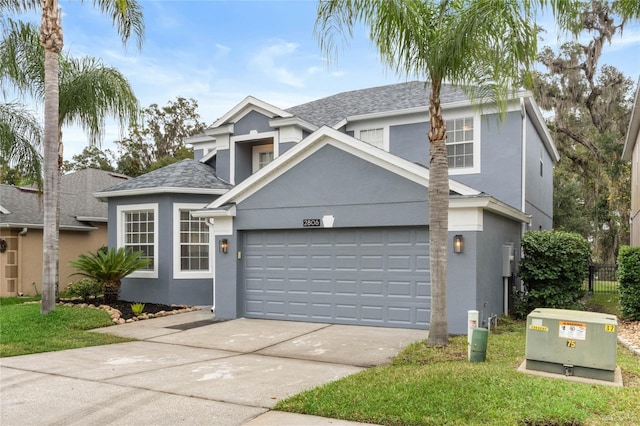 front of property with a garage