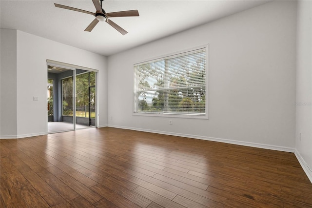 spare room with wood-type flooring and ceiling fan