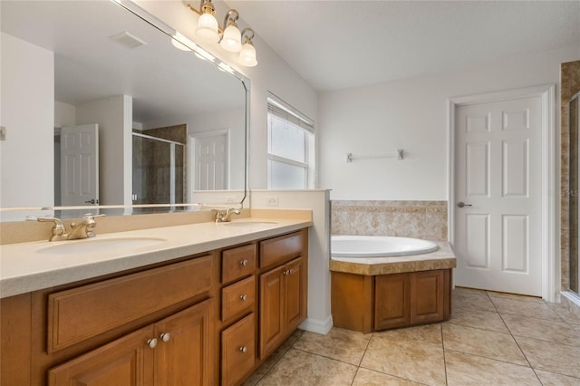 bathroom with tile patterned floors, vanity, and plus walk in shower