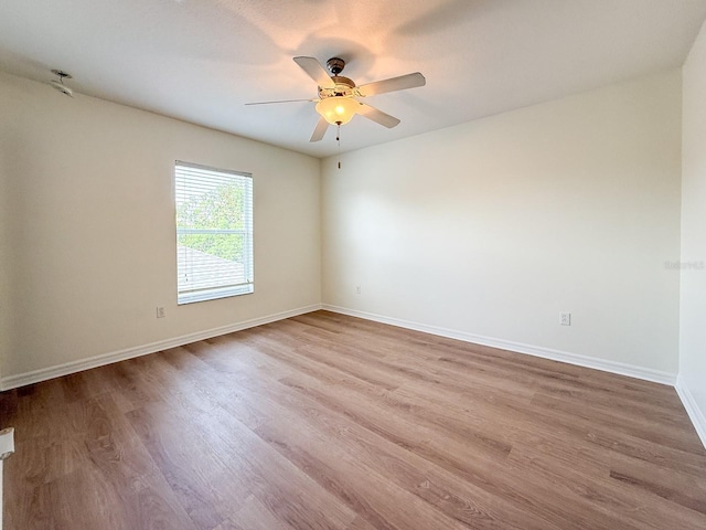 2806 Balforn Tower Way, Winter Garden, FL 34787 - empty room featuring wood finished floors and ceiling fan