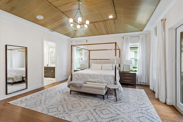 bedroom featuring ensuite bath, wood ceiling, light wood-type flooring, and an inviting chandelier