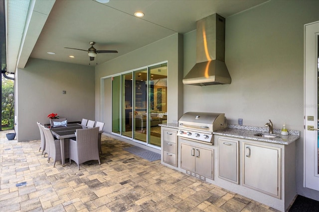 view of patio featuring ceiling fan, area for grilling, grilling area, and sink