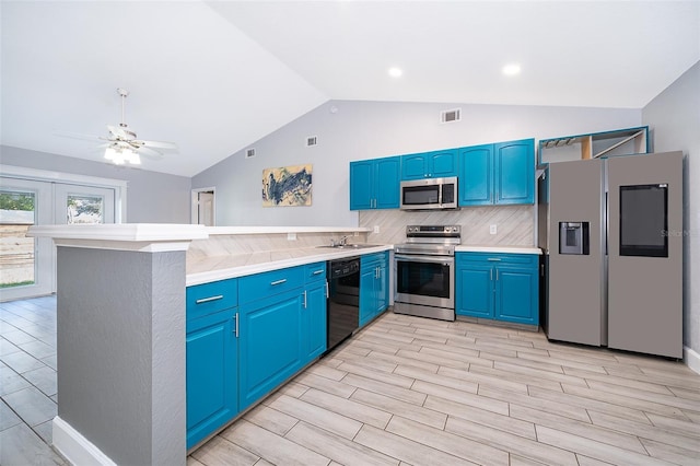 kitchen featuring decorative backsplash, kitchen peninsula, stainless steel appliances, blue cabinets, and ceiling fan