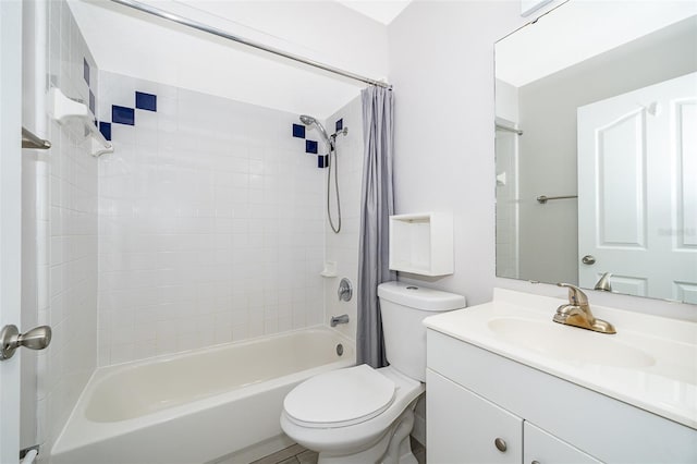 full bathroom featuring vanity, shower / bath combo, and toilet