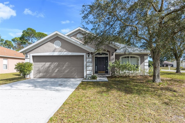 single story home featuring stucco siding, driveway, an attached garage, and a front lawn