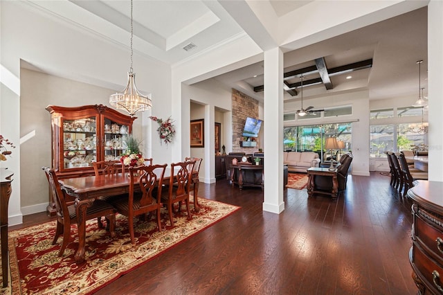 dining room with hardwood / wood-style flooring, baseboards, coffered ceiling, and beamed ceiling