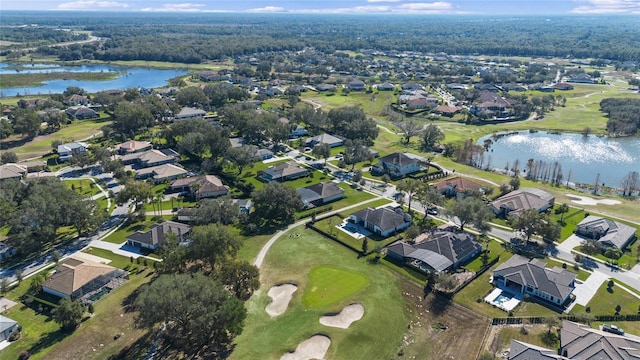 aerial view with a residential view and a water view