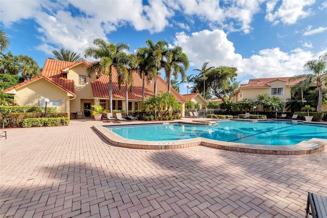 view of swimming pool with a patio