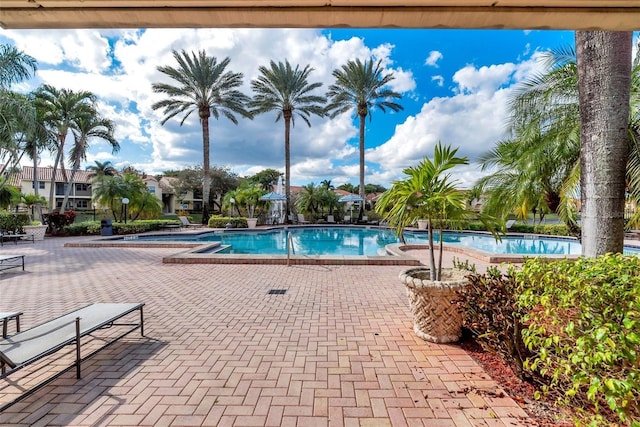 view of swimming pool featuring a patio