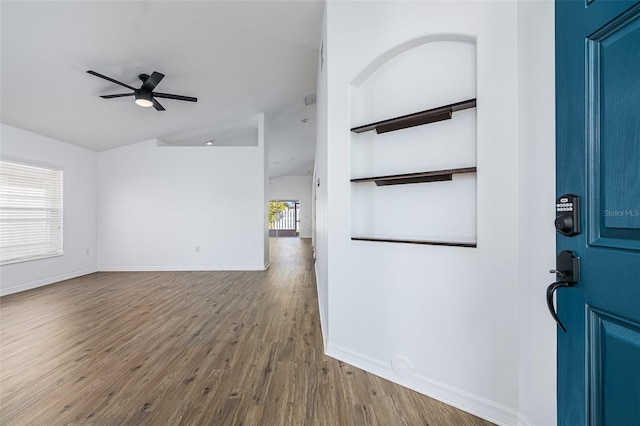 entryway featuring hardwood / wood-style flooring and ceiling fan