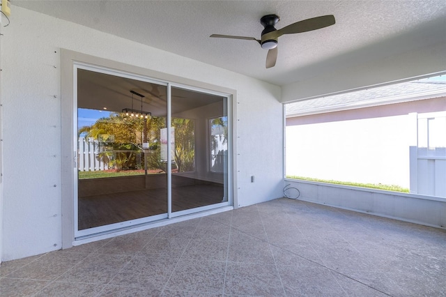 view of patio / terrace featuring ceiling fan