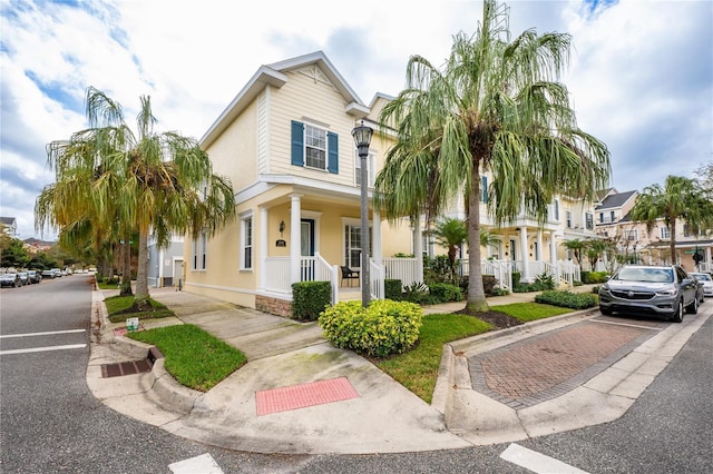 view of front of property featuring covered porch