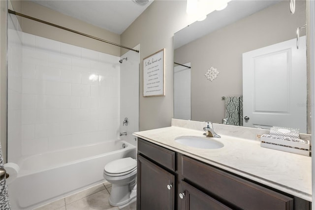 full bathroom featuring tile patterned flooring, vanity, toilet, and shower / bathtub combination