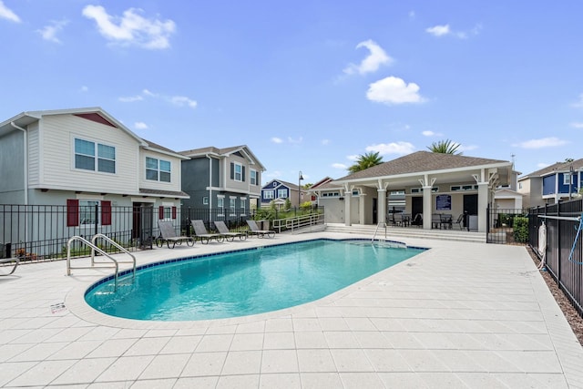 view of pool featuring a patio