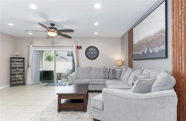 tiled living room with ceiling fan