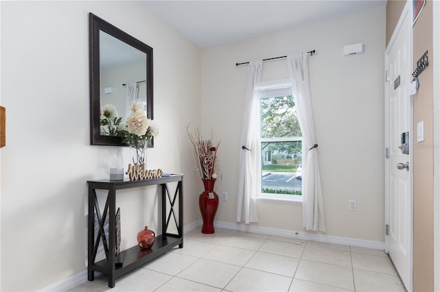 entryway featuring light tile patterned floors