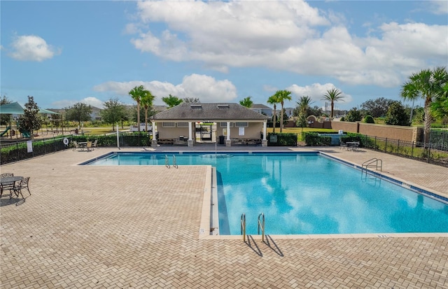 view of pool featuring a patio