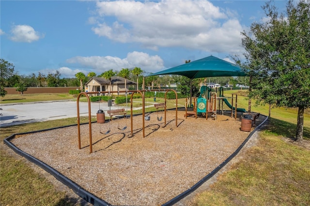 view of playground with a yard