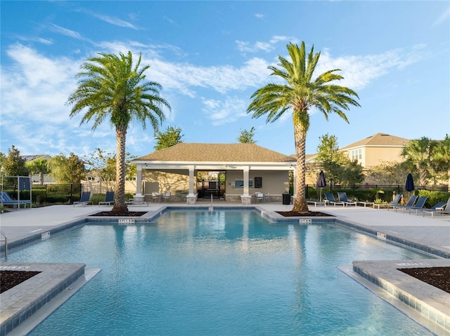 view of swimming pool featuring a patio area