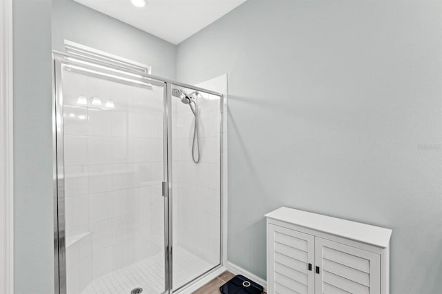 bathroom featuring an enclosed shower