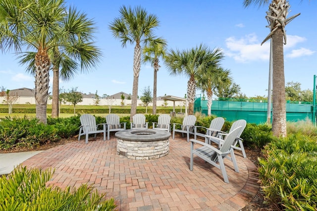 view of patio with a fire pit