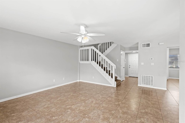 unfurnished room with ceiling fan