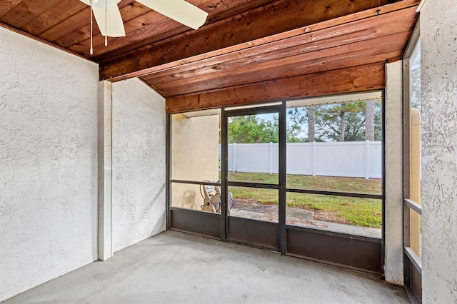 unfurnished sunroom featuring wooden ceiling