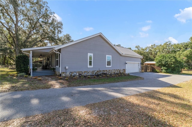 view of side of property with a porch