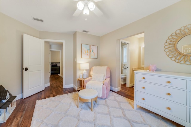 sitting room featuring ceiling fan and dark hardwood / wood-style flooring