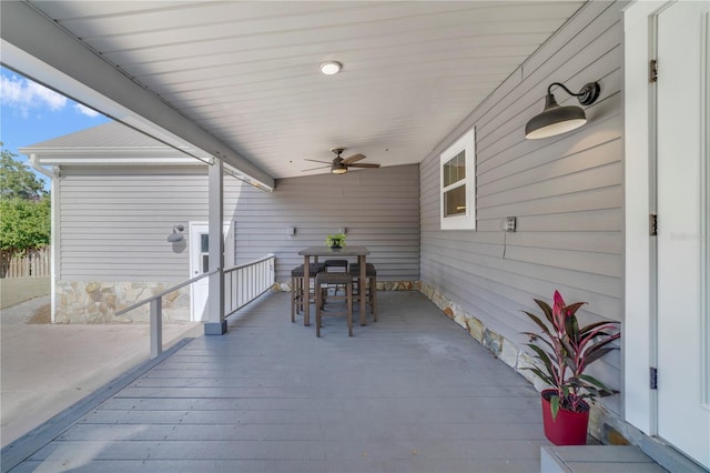 view of patio / terrace featuring ceiling fan