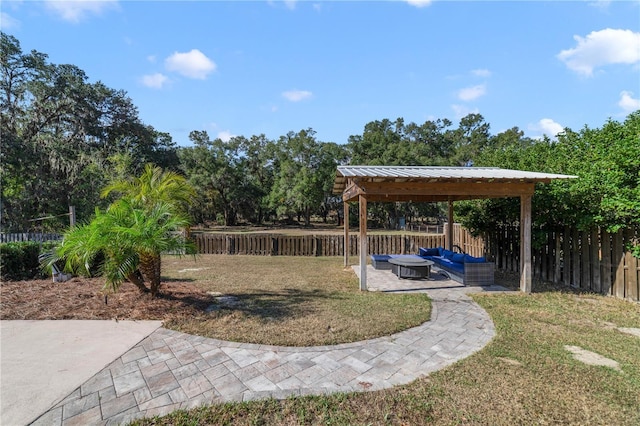 view of yard featuring a gazebo, an outdoor living space, and a patio