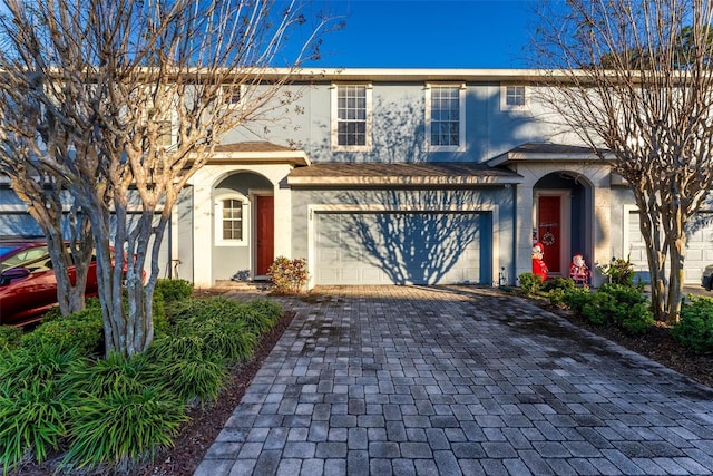 front of property with a garage