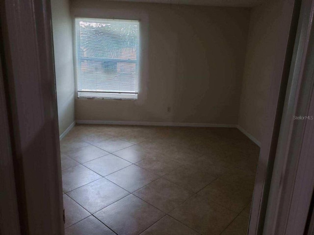 view of tiled spare room